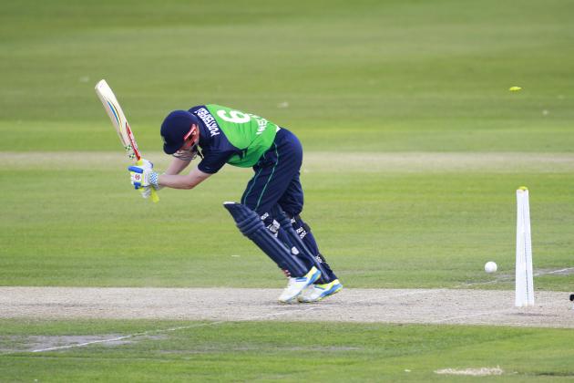 Ireland's batsman William Porterfield is bowled out by Australia's Mitchell Starc during the one day international cricket match at Stormont, Belfast, Northern Ireland, Thursday, Aug. 27, 2015.  (AP Photo/Peter Morrison)