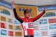 Kris Boeckmans of Belgium celebrates on the podium after winning the first stage of the 45th Etoile de Besseges cycling race between Bellegarde and Beaucaire on February 4, 2015 in Beaucaire, southern France.AFP PHOTO/SYLVAIN THOMAS (Photo credit should read SYLVAIN THOMAS/AFP/Getty Images)