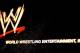 NEW YORK - MARCH 18: The World Wrestling Entertainment logo hangs on a wall at a media conference announcing the all-star lineup of WWE WrestleMania XIX at ESPN Zone in Times Square March 18, 2003 in New York City. (Photo by Mark Mainz/Getty Images)