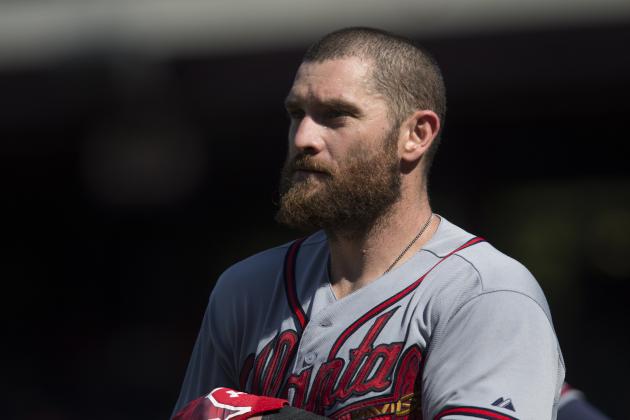 Atlanta Braves left fielder Jonny Gomes (7) in acton during a baseball game against the Philadelphia Phillies, Sunday, Aug. 2, 2015, in Philadelphia. (AP Photo/Laurence Kesterson)