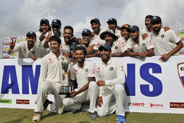 Indian cricketers pose with the trophy after they won the test cricket series against Sri Lanka in Colombo, Sri Lanka, Tuesday, Sept. 1, 2015. India won the third cricket test match by 117 runs and the series by 2-1. (AP Photo/Eranga Jayawardena)