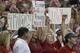 Alabama fans cheer for the Crimson Tide in the first half of an NCAA college football game against Virginia Tech in Atlanta Saturday, Aug. 31, 2013. (AP Photo/Dave Martin)