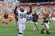 Cleveland Browns defensive end Phil Taylor (98) gestures to fans after a 26-24 win over the New Orleans Saints in an NFL football game Sunday, Sept. 14, 2014, in Cleveland. (AP Photo/David Richard)