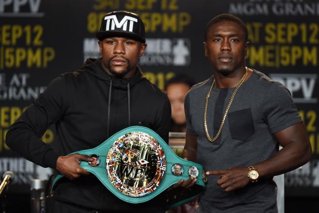 Boxers Floyd 'Money' Mayweather (L) and Andre Berto (R) face off during a press conference to officially announce their September 12 fight that will place at the MGM Grand Garden Arena in Las Vegas, at the Marriott Hotel in Los Angeles, California on August 6, 2015.  Mayweather claims it will be the last ever opportunity to see him fight.          AFP PHOTO / MARK RALSTON        (Photo credit should read MARK RALSTON/AFP/Getty Images)