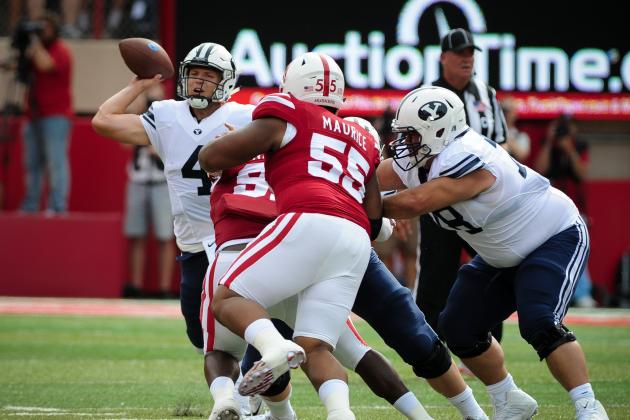 LINCOLN, NE - SEPTEMBER 5: Quarterback Taysom Hill #4 of the Brigham Young Cougars throws over the Nebraska Cornhuskers defense during their game at Memorial Stadium on September 5, 2015 in Lincoln, Nebraska. (Photo by Eric Francis/Getty Images)