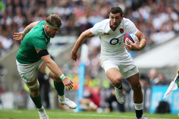 LONDON, ENGLAND - SEPTEMBER 05:  Jonny May of England charges past Jamie Heaslip of Ireland during the QBE International match between England and Ireland at Twickenham Stadium on September 5, 2015 in London, England.  (Photo by Shaun Botterill/Getty Images)