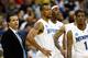 KANSAS CITY, MO - MARCH 21: Head Coach John Calipari, Antonio Anderson #5, Robert Dozier #2 and Willie Kemp #1 of the Memphis Tigers look on from the bench area during their second round game against the Maryland Terrapins in the NCAA Division I Men's Basketball Tournament at the Sprint Center on March 21, 2009 in Kansas City, Missouri. The Tigers defeated the Terrapins 89-70. (Photo by Jamie Squire/Getty Images)