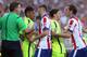 Barcelona's Brazilian forward Neymar da Silva Santos Junior (2nd L) and Barcelona's Argentinian forward Lionel Messi (2nd R) argue with Atletico Madrid's Brazilian defender Guilherme Siqueira (C) and Atletico Madrid's midfielder Juanfran (R) during the Spanish league football match Club Atletico de Madrid vs FC Barcelona at the Vicente Calderon stadium in Madrid on May 17, 2015. AFP PHOTO / CESAR MANSO (Photo credit should read CESAR MANSO/AFP/Getty Images)