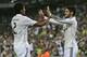 Real Madrid's French defender Raphael Varane (L) is congratulated by his teammate Real Madrid's forward Isco after scoring during the Spanish Copa del Rey (King's Cup) football match Cornella against Real Madrid at the Power8 stadium in Cornella-El Prat near Barcelona, on October 29, 2014. AFP PHOTO/ JOSEP LAGO (Photo credit should read JOSEP LAGO/AFP/Getty Images)