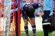 Tottenham Hotspur's Ryan Mason, center, recieves treatment after celebrating his goal during their English Premier League soccer match between Sunderland and Tottenham Hotspur at the Stadium of Light, Sunderland, England, Sunday, Sept. 13, 2015. (AP Photo/Scott Heppell)