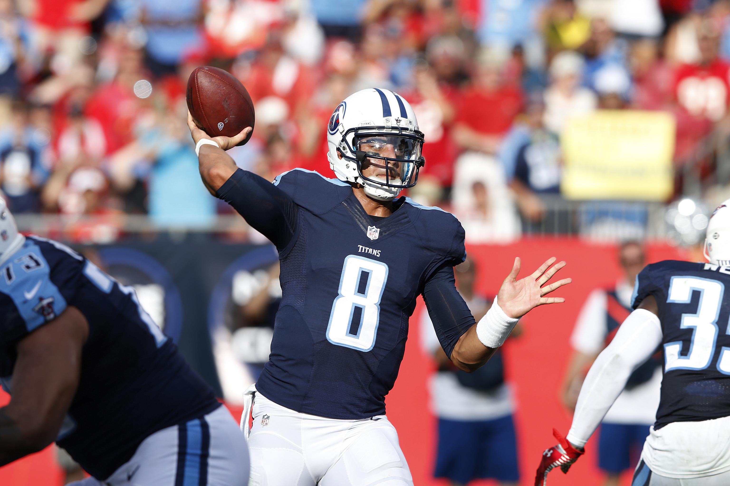 East Rutherford, New Jersey, USA. 13th Dec, 2015. Tennessee Titans  quarterback Marcus Mariota (8) in action prior to the NFL game between the Tennessee  Titans and the New York Jets at MetLife