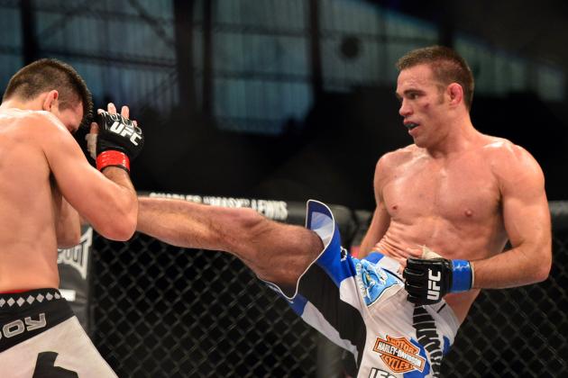 Oct 9, 2013; Barueri, Sao Paulo, Brazil; Demian Maia (red gloves) fights against Jake Shields (blue gloves) during UFC Fight Night 29 at Jose Correa Arena. Mandatory Credit: Jason Silva-USA TODAY Sports