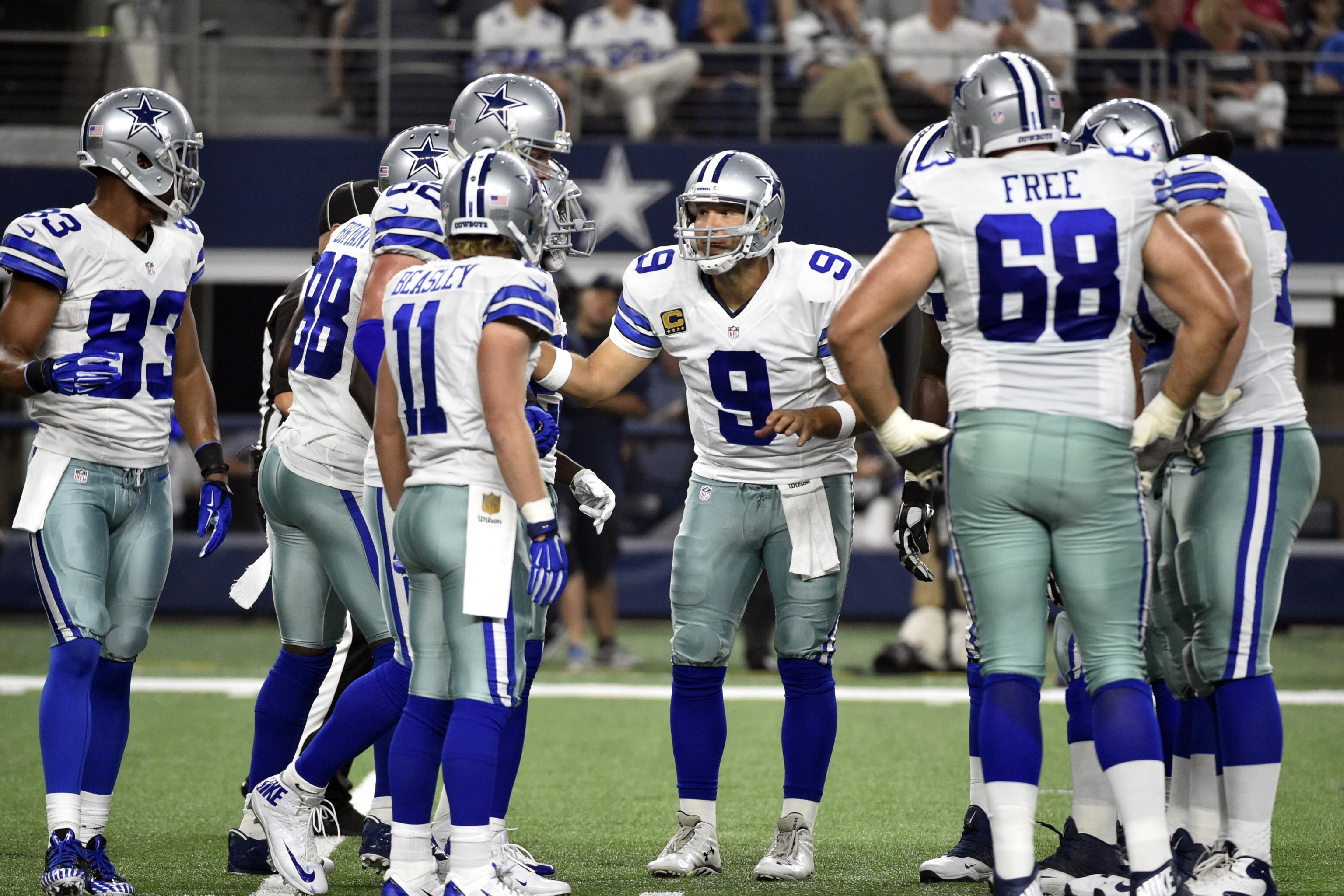 Romo rallies Cowboys past Dolphins