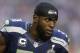 Seattle Seahawks strong safety Kam Chancellor (31) warms up before the NFL Super Bowl XLIX football game against the New England Patriots Sunday, Feb. 1, 2015, in Glendale, Ariz. (AP Photo/Ben Margot)