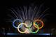 Fireworks explode behind the Olympic rings during their inauguration at the Madureira Park in Rio de Janeiro, Brazil, Wednesday, May 20, 2015. The rings are a gift from the city of London. (AP Photo/Felipe Dana)