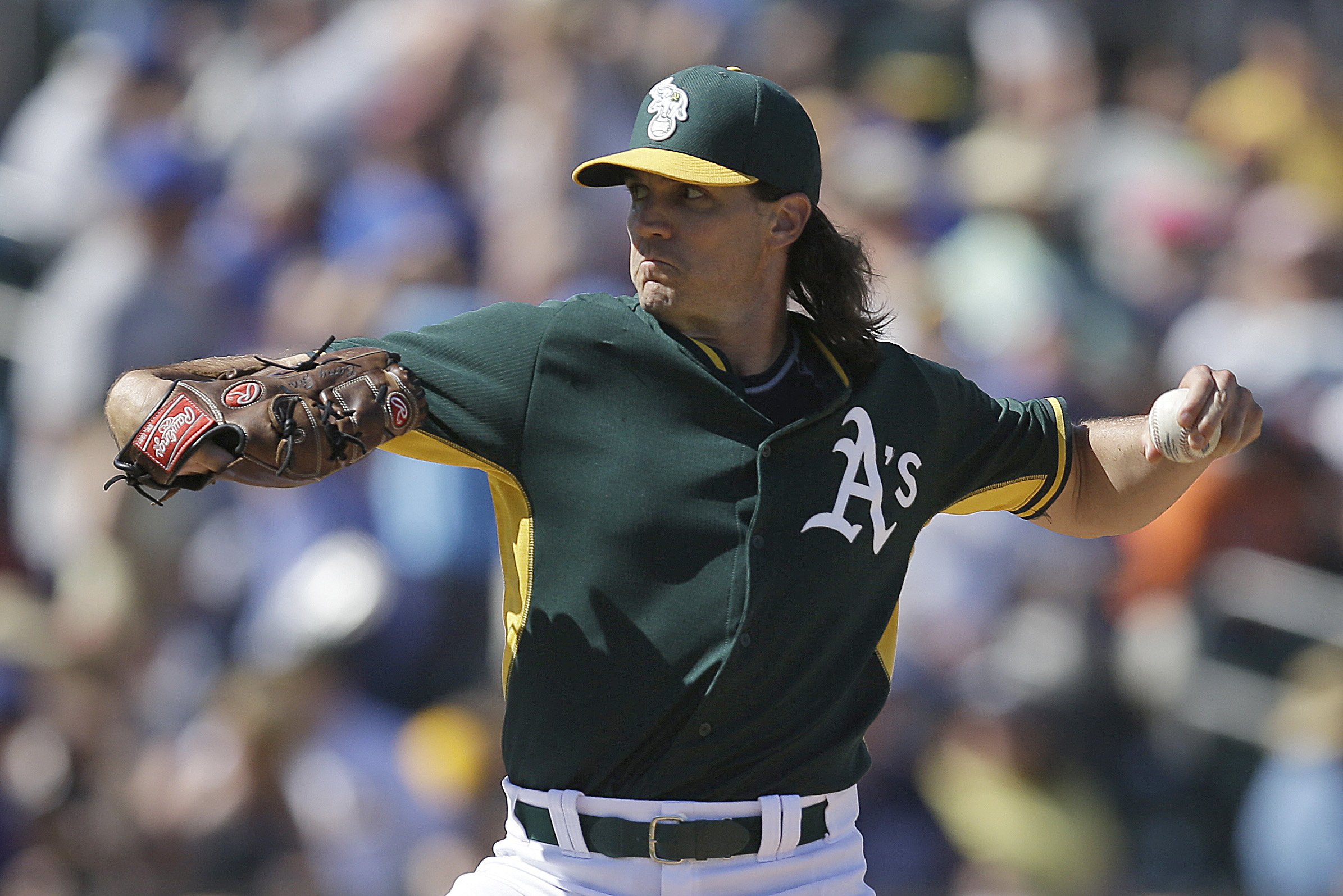 Oakland Athletics pitcher Barry Zito looks at the scoreboard after