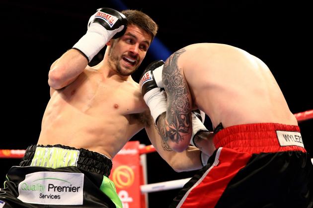 SHEFFIELD, ENGLAND - MARCH 28: Stephen Smith (L) of Great Britain lands a blow on Jacek Wylezol of Poland during a super featherweight contest at Motorpoint Arena on March 28, 2015 in Sheffield, England. (Photo by Richard Heathcote/Getty Images)