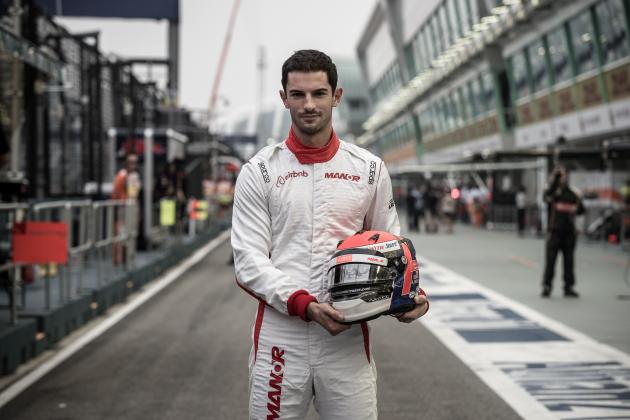 Manor Marussia F1 Team's US driver Alexander Rossi poses for a photo before the practice session of the Formula One Singapore Grand Prix in Singapore on September 18, 2015. AFP PHOTO / Philippe Lopez        (Photo credit should read PHILIPPE LOPEZ/AFP/Getty Images)