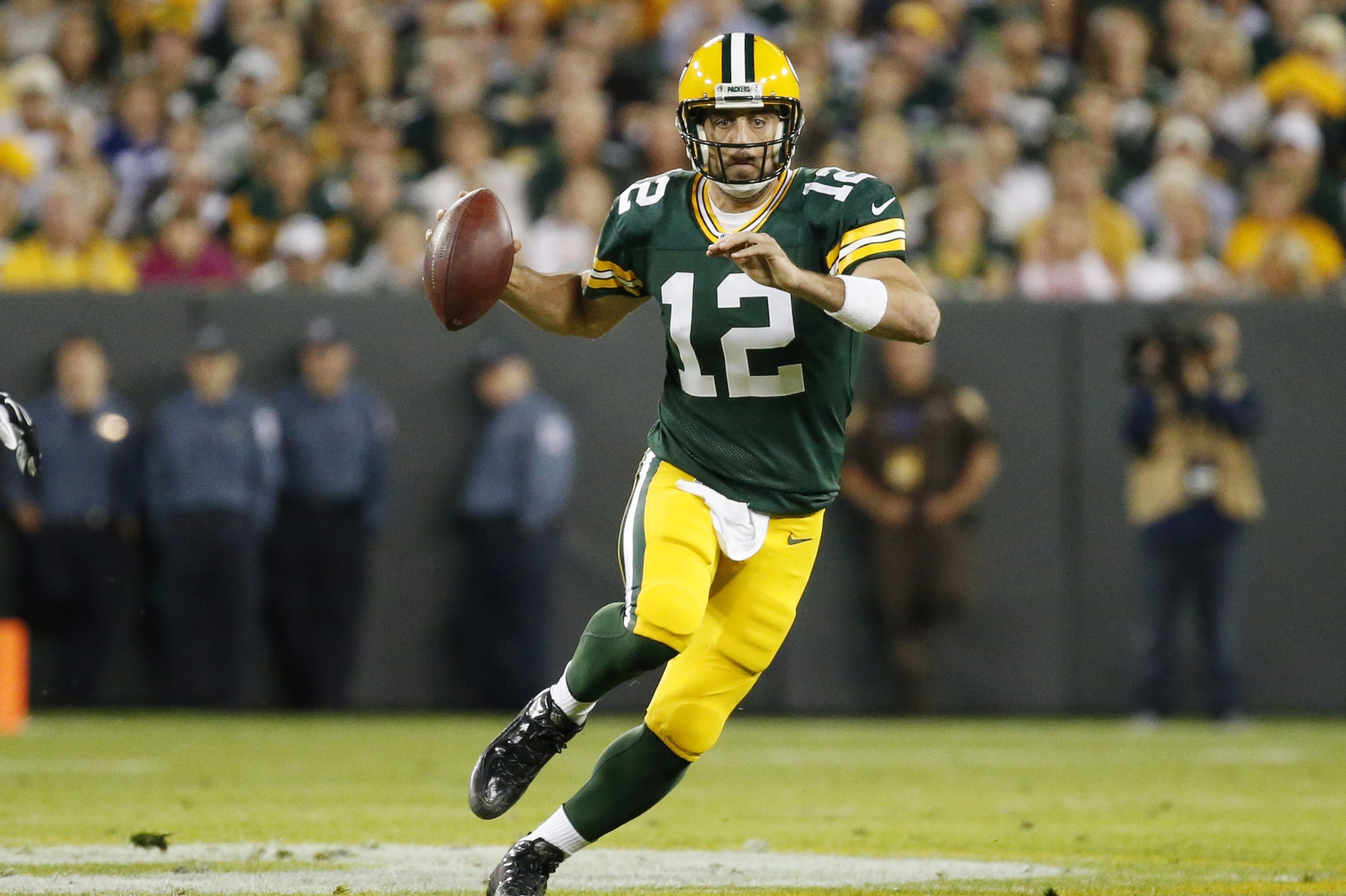 Aaron Rodgers is playing quarterback like it has never been played, smirk  and all