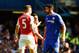 Two naughty Arsenal players gang up on the immaculately behaved Diego Costa.