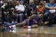 Detroit Pistons guard Brandon Jennings shouts after falling to the floor while playing against the Milwaukee Bucks during the second half of an NBA basketball game Saturday, Jan. 24, 2015, in Milwaukee. (AP Photo/Darren Hauck)