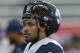 Utah State quarterback Chuckie Keeton (16) looks on during practice before the start of their NCAA college football game against Utah Friday, Sept. 11, 2015, in Salt Lake City. (AP Photo/Rick Bowmer)