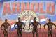Competitors flex their muscles during the semifinal of the Arnold Classic Europe bodybuilding event in Madrid, Spain, Saturday, Oct. 13, 2012. (AP Photo/Andres Kudacki)