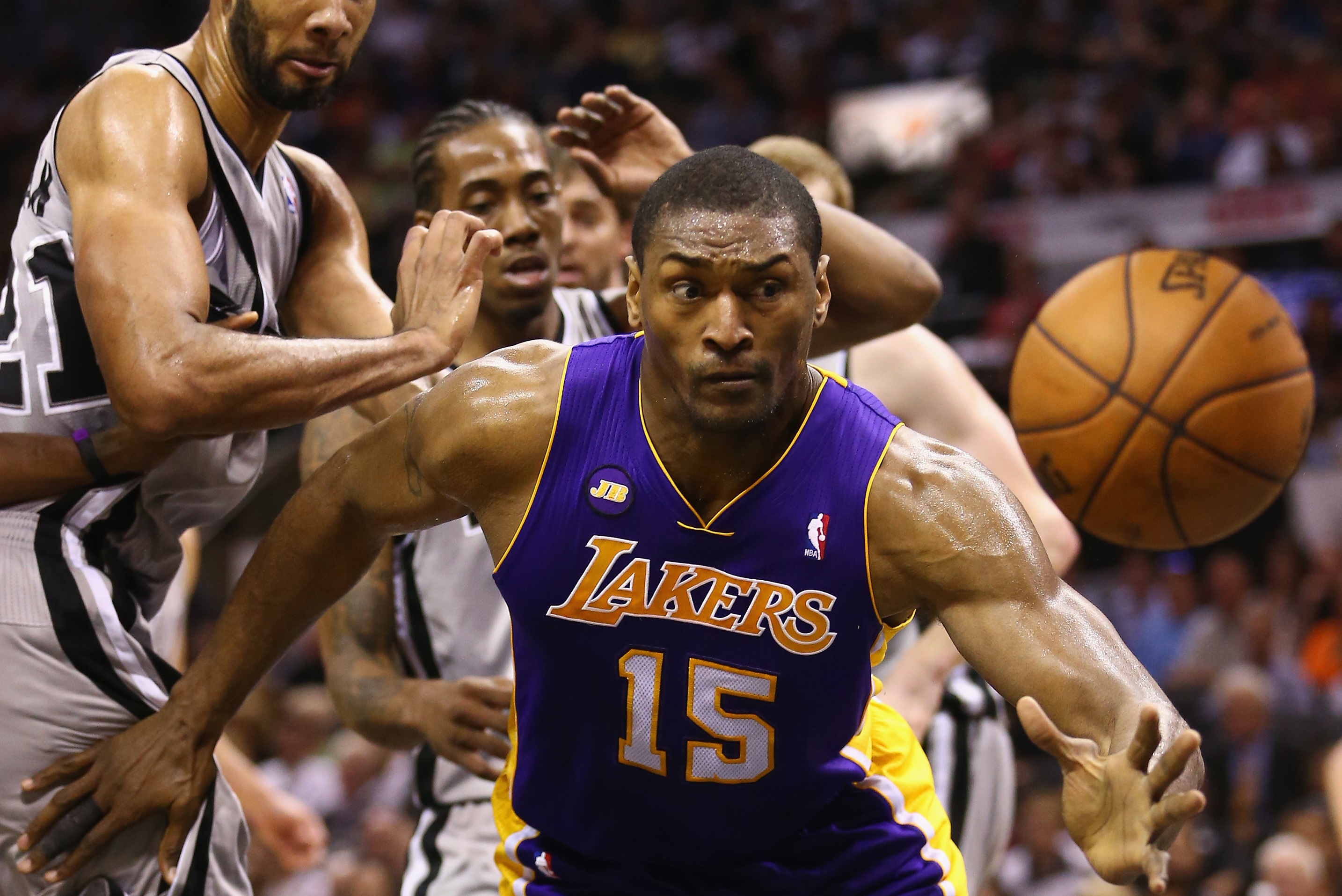 Los Angeles Lakers small forward Metta World Peace, right, works