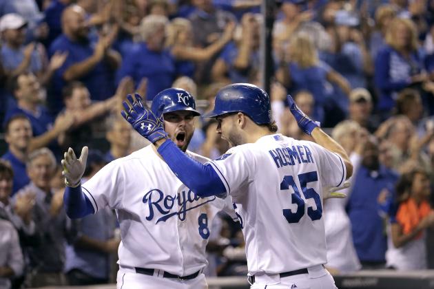 Kansas City Royals' Eric Hosmer (35) celebrates with Mike Moustakas after hitting a solo home run to tie the score during the fifth inning of a baseball game against the Seattle Mariners on Thursday, Sept. 24, 2015, in Kansas City, Mo. (AP Photo/Charlie Riedel)