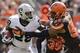 Oakland Raiders running back Latavius Murray (28) tries to get past Cleveland Browns defensive end Armonty Bryant (95) during the first half of an NFL football game, Sunday, Sept. 27, 2015, in Cleveland. (AP Photo/Aaron Josefczyk)