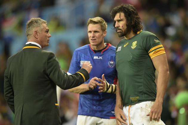 South Africa's head coach Heyneke Meyer (L) congratulates South Africa's centre and captain Jean de Villiers (C) and South Africa's lock Victor Matfield following the team's Pool B match of the 2015 Rugby World Cup between South Africa and Samoa at Villa Park in Birmingham, central England, on September 26, 2015.  AFP PHOTO / LIONEL BONAVENTURE

RESTRICTED TO EDITORIAL USE, NO USE IN LIVE MATCH TRACKING SERVICES, TO BE USED AS NON-SEQUENTIAL STILLS        (Photo credit should read LIONEL BONAVENTURE/AFP/Getty Images)