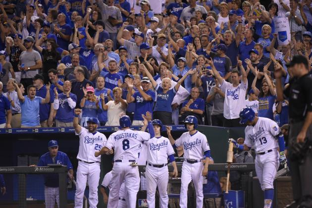 KANSAS CITY, MO - SEPTEMBER 24:  Fans cheer after Mike Moustakas #8 of the Kansas City Royals scored on a Alex Rios triple in the eighth inning against the Seattle Mariners at Kauffman Stadium on September 24, 2015 in Kansas City, Missouri. (Photo by Ed Zurga/Getty Images)