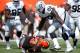 CLEVELAND, OH - SEPTEMBER 27: Stacy McGee #92 of the Oakland Raiders sacks Josh McCown #13 of the Cleveland Browns during the first quarter at FirstEnergy Stadium on September 27, 2015 in Cleveland, Ohio. (Photo by Joe Robbins/Getty Images)