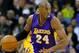 Los Angeles Lakers guard Kobe Bryant (24) drives with the ball during the first half of an NBA basketball game against the New Orleans Pelicans, Wednesday, Jan. 21, 2015, in New Orleans. (AP Photo/Jonathan Bachman)