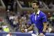 Novak Djokovic, of Serbia, reacts after winning a game against Roger Federer, of Switzerland, in the men's championship match of the U.S. Open tennis tournament, Sunday, Sept. 13, 2015, in New York. (AP Photo/Peter Morgan)