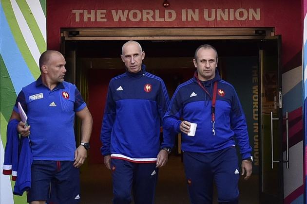 (from L) France's assistant coach Yannick Bru, assistant coach Patrice Lagisquet and head coach Philippe Saint Andre arrive for a training session at Stadium MK in Milton Keynes, north of London, on September 30, 2015 on the eve of their match of the 2015 Rugby Union World Cup against Canada. AFP PHOTO / FRANCK FIFE  -- RESTRICTED TO EDITORIAL USE        (Photo credit should read FRANCK FIFE/AFP/Getty Images)