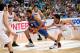 Yuta Tabuse (R) of Japan challenges Ranidel De Ocampo (C) of the Philippines during the semi-final match at the FIBA Asia Basketball championship in Changsha, China's Hunan province on October 2, 2015. AFP PHOTO (Photo credit should read STR/AFP/Getty Images)