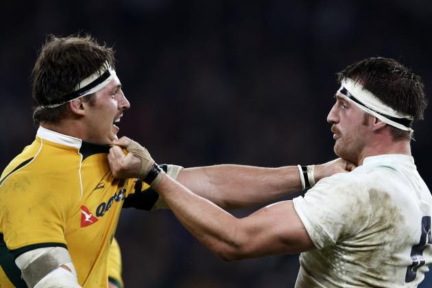 England flanker Tom Wood (R) and Australia's lock Rob Simmons (L) clash during the Autumn International rugby union Test match between England and Australia at Twickenham Stadium, southwest of London on November 29, 2014. England won the game 26-17. AFP PHOTO / ADRIAN DENNIS (Photo credit should read ADRIAN DENNIS/AFP/Getty Images)