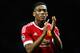 MANCHESTER, ENGLAND - SEPTEMBER 30: Anthony Martial of Manchester United applauds the crowd after victory in the UEFA Champions League Group B match between Manchester United FC and VfL Wolfsburg at Old Trafford on September 30, 2015 in Manchester, United Kingdom.(Photo by Dean Mouhtaropoulos/Getty Images)
