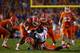 GAINESVILLE, FL - OCTOBER 03: Laquon Treadwell #1 of the Mississippi Rebels is stopped by Daniel McMillian #13 and Jalen Tabor #31 of the Florida Gators during the first half of the game on October 3, 2015 in Gainesville, Florida. (Photo by Rob Foldy/Getty Images)