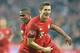 Bayern's Robert Lewandowski, right, and Bayern's Douglas Costa celebrate after scoring during the Champions League group F soccer match between Bayern Munich and Dinamo Zagreb in Munich, Germany, Tuesday, Sept. 29, 2015.(AP Photo/Kerstin Joensson)