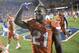 Florida running back Kelvin Taylor (21) salutes fans in the stands after an NCAA college football game against Mississippi Saturday, Oct. 3, 2015, in Gainesville, Fla. Florida won 38-10. (AP Photo/Phelan M. Ebenhack)