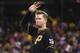 Pittsburgh Pirates starting pitcher A.J. Burnett (34) waves to the fans after being lifted in the seventh inning of a baseball game against the Cincinnati Reds, Saturday, Oct. 3, 2015, in Pittsburgh. This was Burnett's last start in regular season as he had announced earlier in the year he was retiring at the end of this season. (AP Photo/Keith Srakocic)