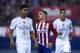 MADRID, SPAIN - OCTOBER 04: Antoine Griezmann (2ndL) of Atletico de Madrid reacts as he fail to score surrounded by Gabi Fernandez (L) of Real Madrid CF and his teammate Raphael Varane (R) during the La Liga match between Club Atletico de Madrid and Real Madrid CF at Vicente Calderon Stadium on October 4, 2015 in Madrid, Spain. (Photo by Gonzalo Arroyo Moreno/Getty Images)