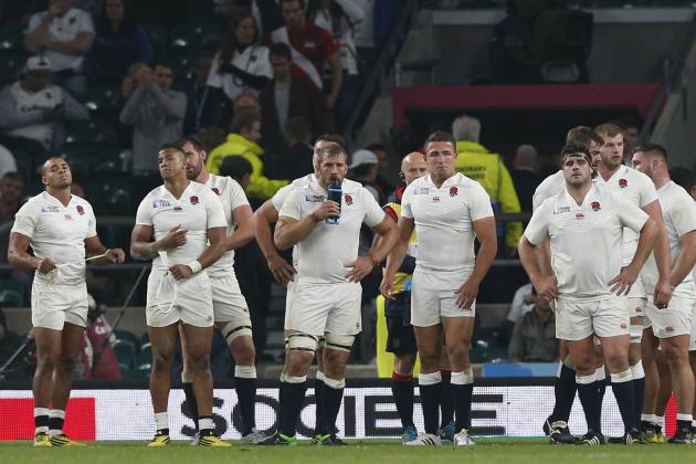 England players react after losing 33-13 in the Rugby World Cup Pool A match between England and Australia at Twickenham stadium in London, Saturday, Oct. 3, 2015. (AP Photo/Christophe Ena)