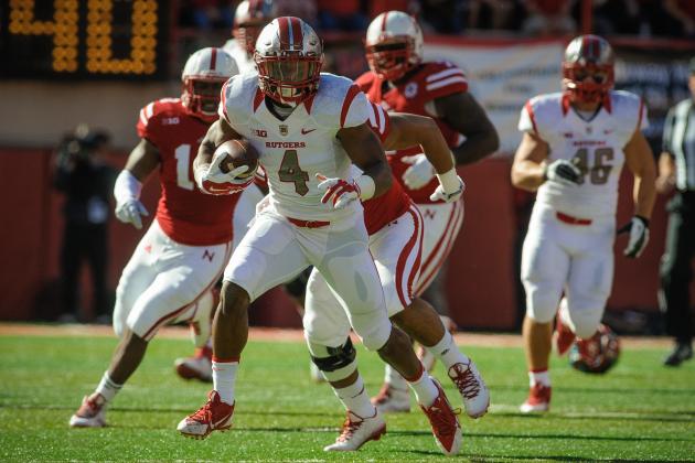 LINCOLN, NE - OCTOBER 25: Wide receiver Leonte Carroo #4 of the Rutgers Scarlet Knights outruns linebacker David Santos #41 of the Nebraska Cornhuskers during the game at Memorial Stadium on October 25, 2014 in Lincoln, Nebraska. Nebraska defeated Rutgers 42-24. (Photo by Eric Francis/Getty Images)