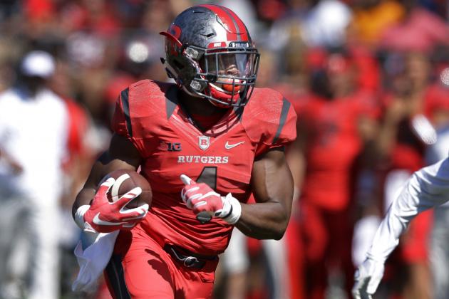 FILE - In this Saturday, Sept. 5, 2015 file photo, Rutgers wide receiver Leonte Carroo (4) runs with the ball during an NCAA college football game against Norfolk State in Piscataway, N.J. Carroo has been charged with assault in yet another arrest and suspension of a football player at the school. The team announced that he was suspended even before officials said Monday, Sept. 14, 2015, he had been arrested. The senior was charged with assault under domestic violence in connection with an unspecified matter Saturday after the team's game. (AP Photo/Mel Evans, File)