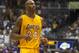 Los Angeles Lakers guard Kobe Bryant (24) is seen on the court during the second half of an NBA preseason basketball game against the Utah Jazz, Tuesday, Oct. 6, 2015, in Honolulu. The Jazz defeated the Lakers 117-114. (AP Photo/Marco Garcia)