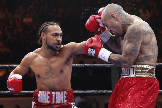 TAMPA, FL - JULY 11: Keith Thurman (L) exchanges blows with Luis Collazo during their WBA Welterweight fight on July 11, 2015 at the USF Sun Dome in Tampa, Florida. (Photo by Brian Blanco/Getty Images)