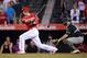 September 30, 2015; Anaheim, CA, USA; Los Angeles Angels third baseman David Freese (6) hits a single in the ninth inning against the Oakland Athletics at Angel Stadium of Anaheim. Mandatory Credit: Gary A. Vasquez-USA TODAY Sports